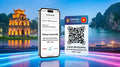 A promotional image for a 7-day Vietnam travel eSIM plan. It shows an iPhone displaying active mobile data with the 'Vietnam Travel eSIM' plan, providing 5GB of high-speed data daily, plus unlimited local calls and texts, for 7 days. The screen indicates compatibility with Viettel, Vinaphone, and Mobifone networks. Next to it is an eSIM QR code card. The background features the night skyline of Hanoi with Hoan Kiem Lake and Ha Long Bay.